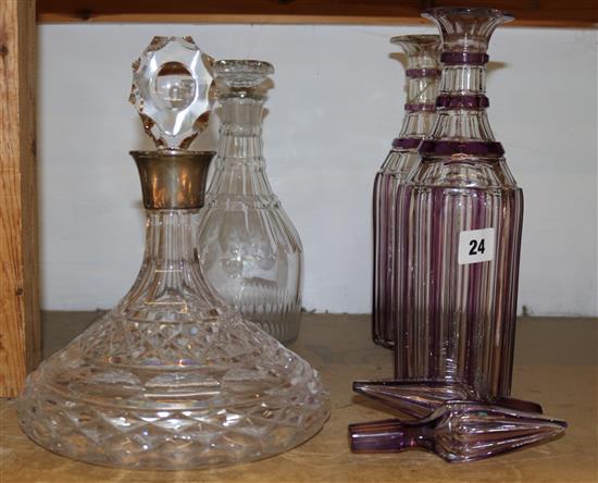 Silver mounted glass ships decanter, Regency cut glass mallet shaped decanter and pair of amethyst flash cut decanters (a.f.) (4)